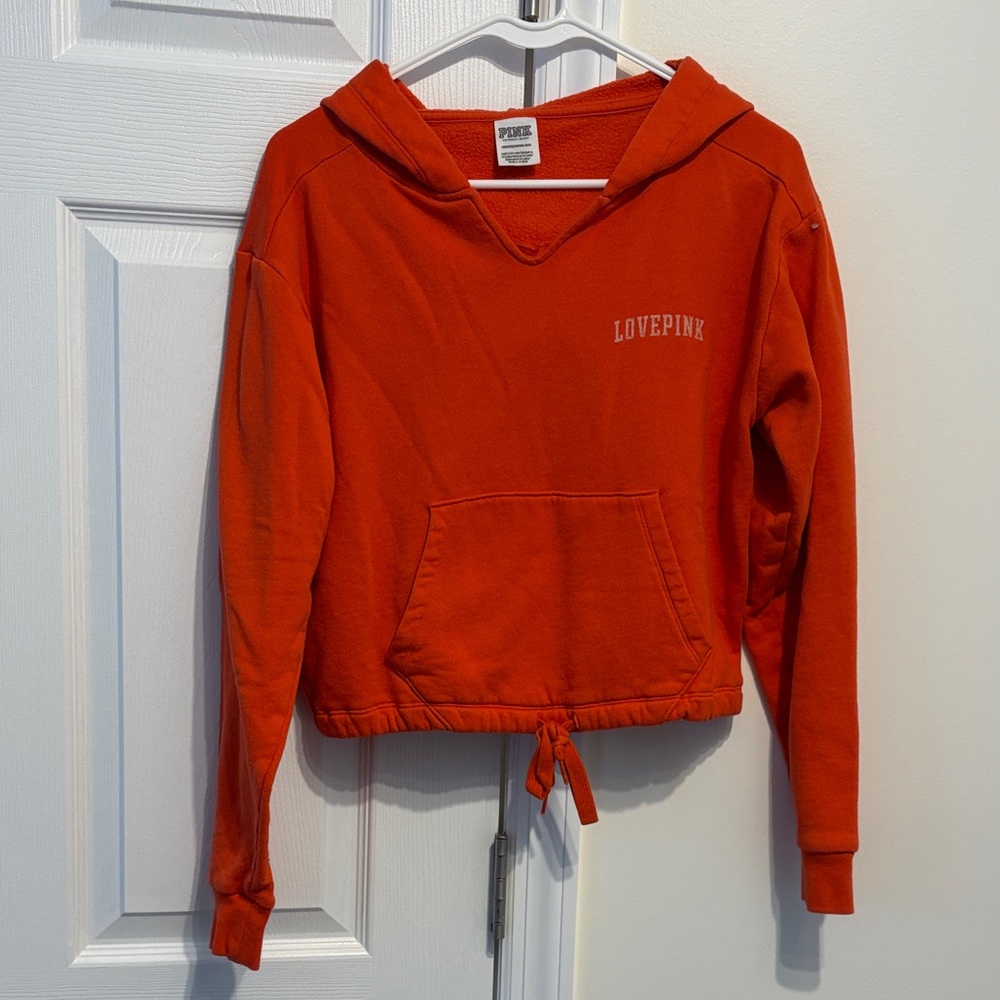 Victoria’s Secret pink, hooded, orange cropped sweatshirt